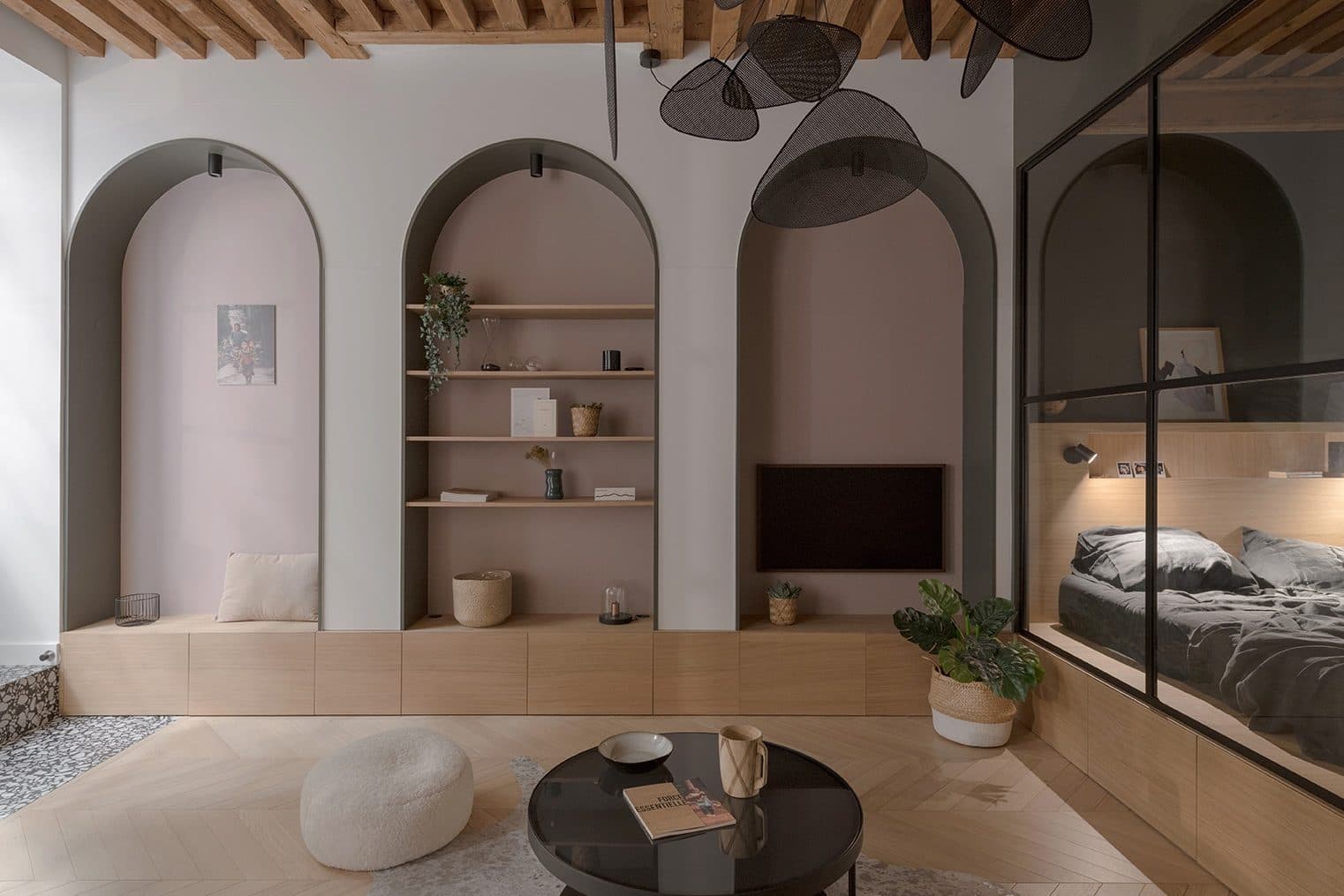 Couchage intégré dans une boîte vitrée